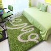 Zelený koberec shaggy SPIRÁLA