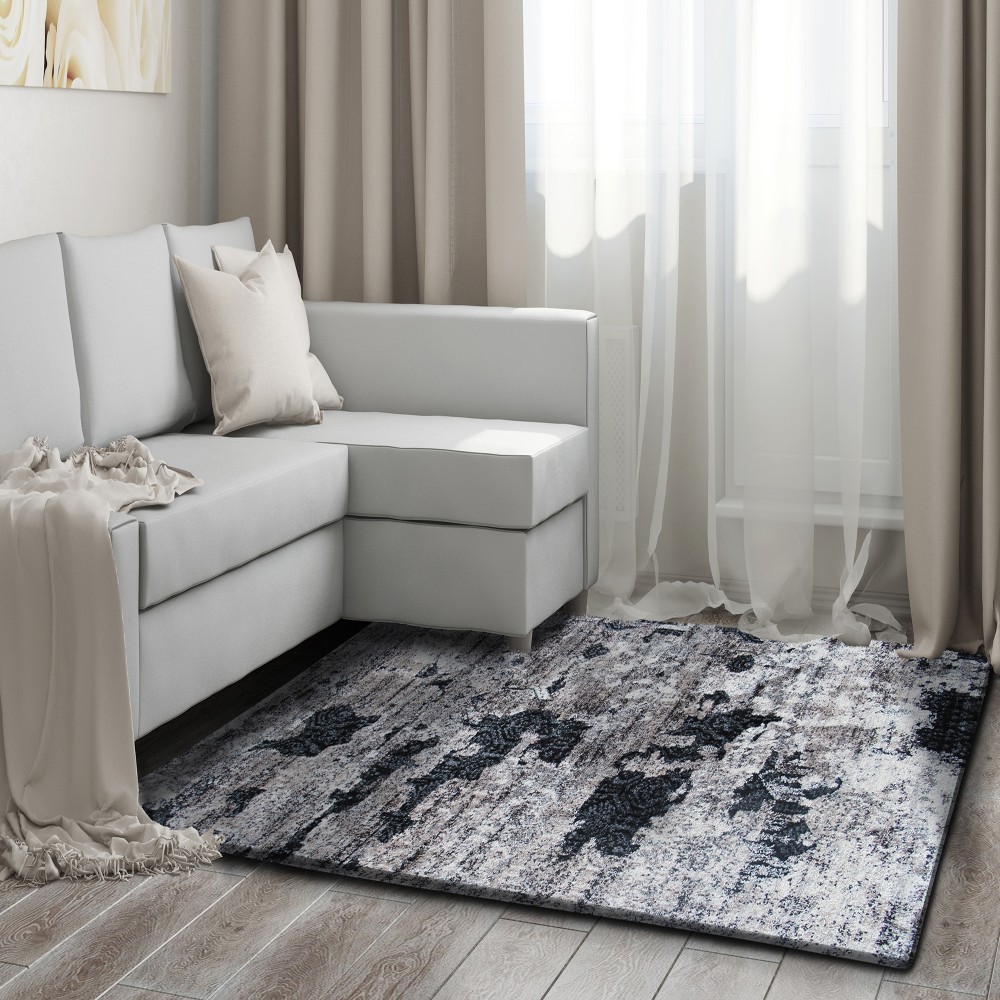 Kusový koberec v hnědé barvě do ložnice