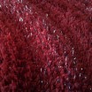 Elegantní kulatý koberec v bordó barvě