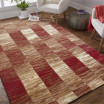 Kusový koberec v červené barvě do ložnice