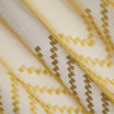 Stylová žlutá záclona se vzorem na spodní části 140 x 250 cm