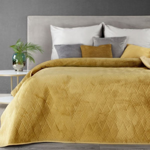 Krásný žlutý přehoz na postel s motivem geometrických tvarů