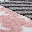 Vzorovaný růžový kulatý koberec do dětského pokoje