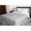 Oboustranné přehozy přes postel v šedě bílé barvě s prošíváním