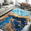 Protiskluzový koberec v modré barvě s abstraktním vzorem