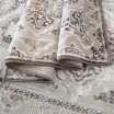 Elegantný koberec hnedej farby vo vintage štýle