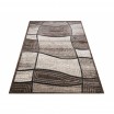 Kvalitní hnědý stylový koberec a abstraktním vzorem