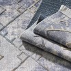 Moderní šedý koberec s třásněmi ve skandinávském stylu