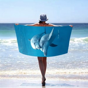 Modrá plážová osuška s delfíny