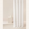 Moderní krémová záclona  Marisa  se stříbrnými průchodkami 140 x 280 cm