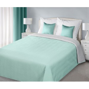 Modré oboustranné přikrývky na postel