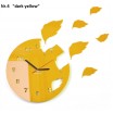 Designové zelené hodiny s efektem létajícího listí