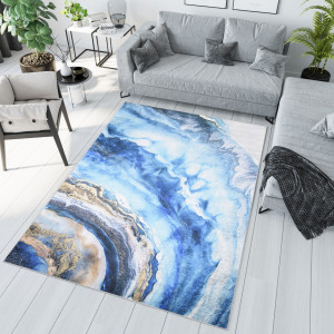 Moderní modrý koberec s abstraktním vzorem